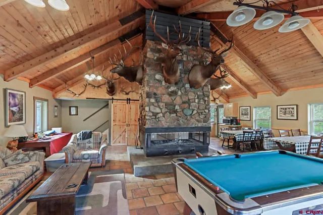 a room with furniture and a chandelier