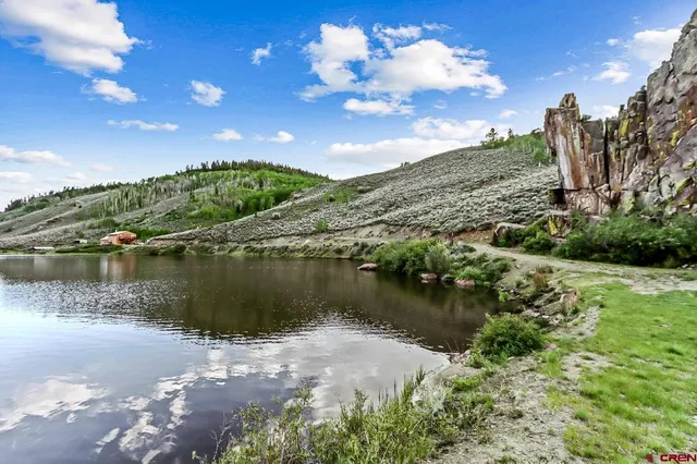 a view of a lake with a mountain