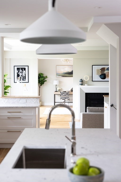 111 Jordan Road Brookline, MA 02446 - Photo 13 of 42 a living room with furniture and a fireplace