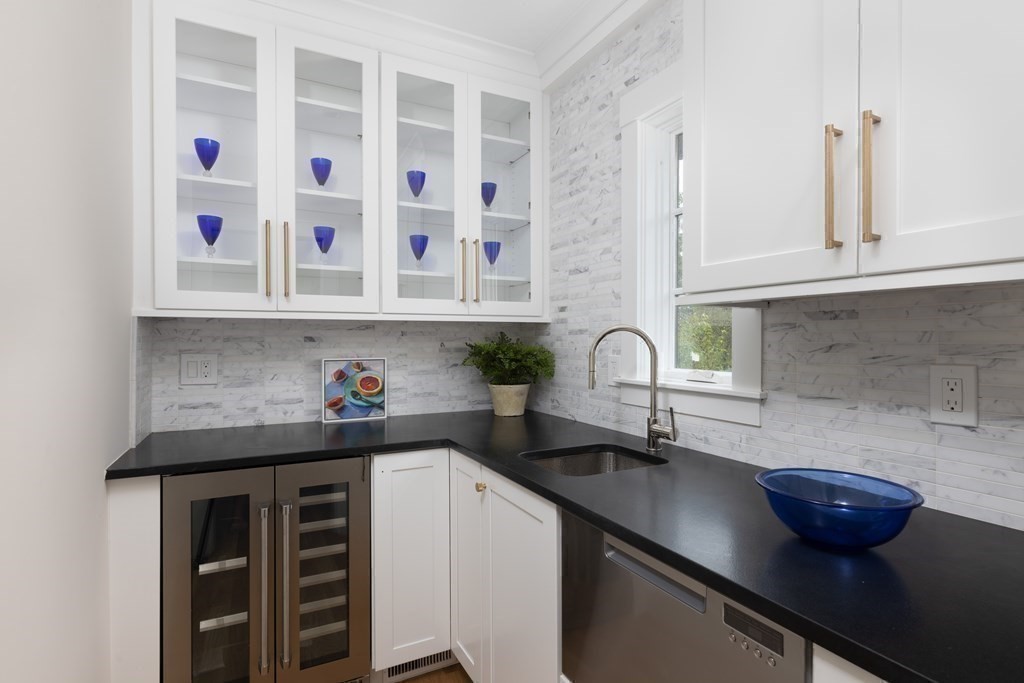 111 Jordan Road Brookline, MA 02446 - Photo 14 of 42 a kitchen with stainless steel appliances a sink and a counter space