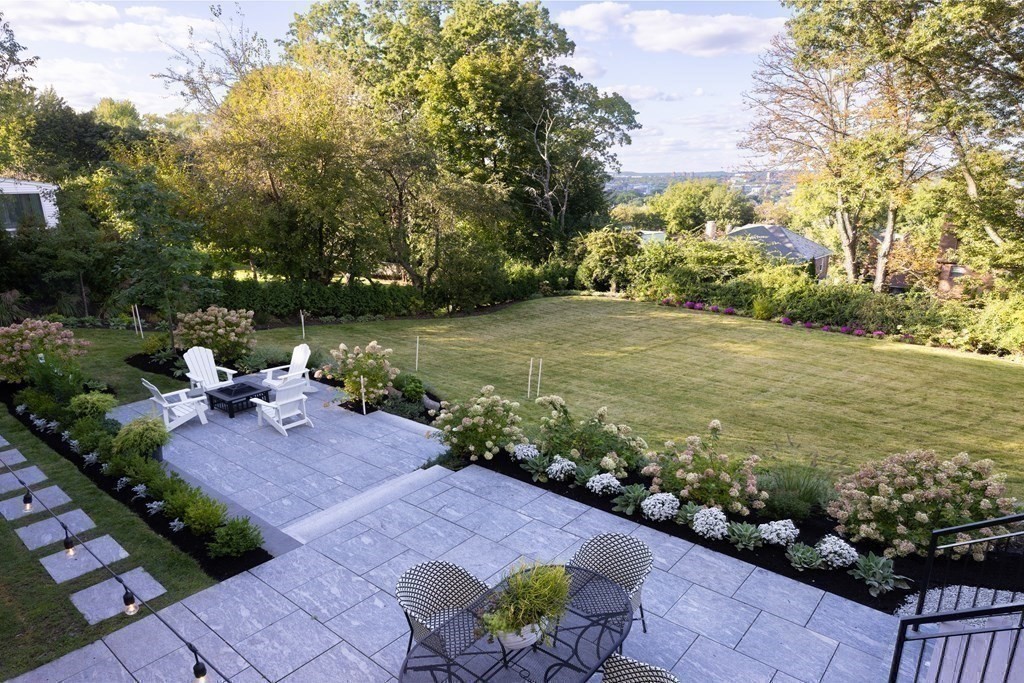 111 Jordan Road Brookline, MA 02446 - Photo 19 of 42 a view of a lake with a patio