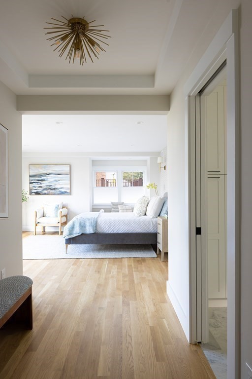 111 Jordan Road Brookline, MA 02446 - Photo 22 of 42 a living room with a bed furniture and a window