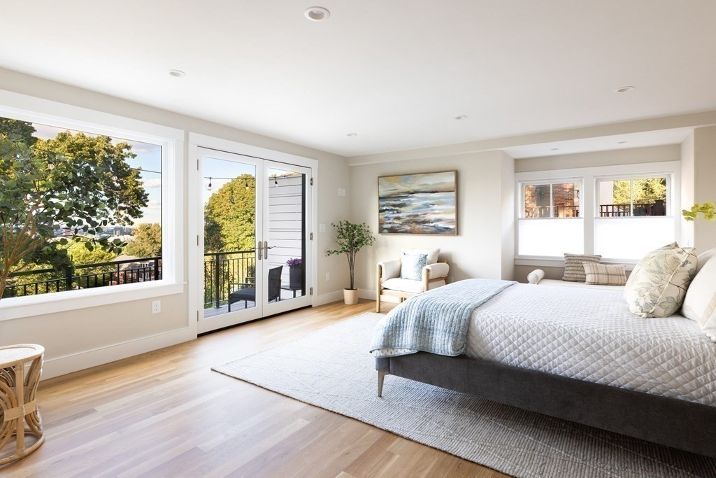 111 Jordan Road Brookline, MA 02446 - Photo 23 of 42 a bedroom with a large bed and a large window