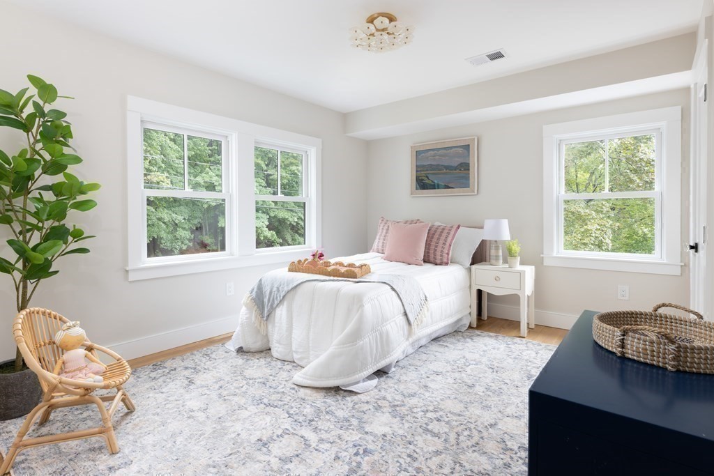 111 Jordan Road Brookline, MA 02446 - Photo 27 of 42 a bedroom with a bed and a window