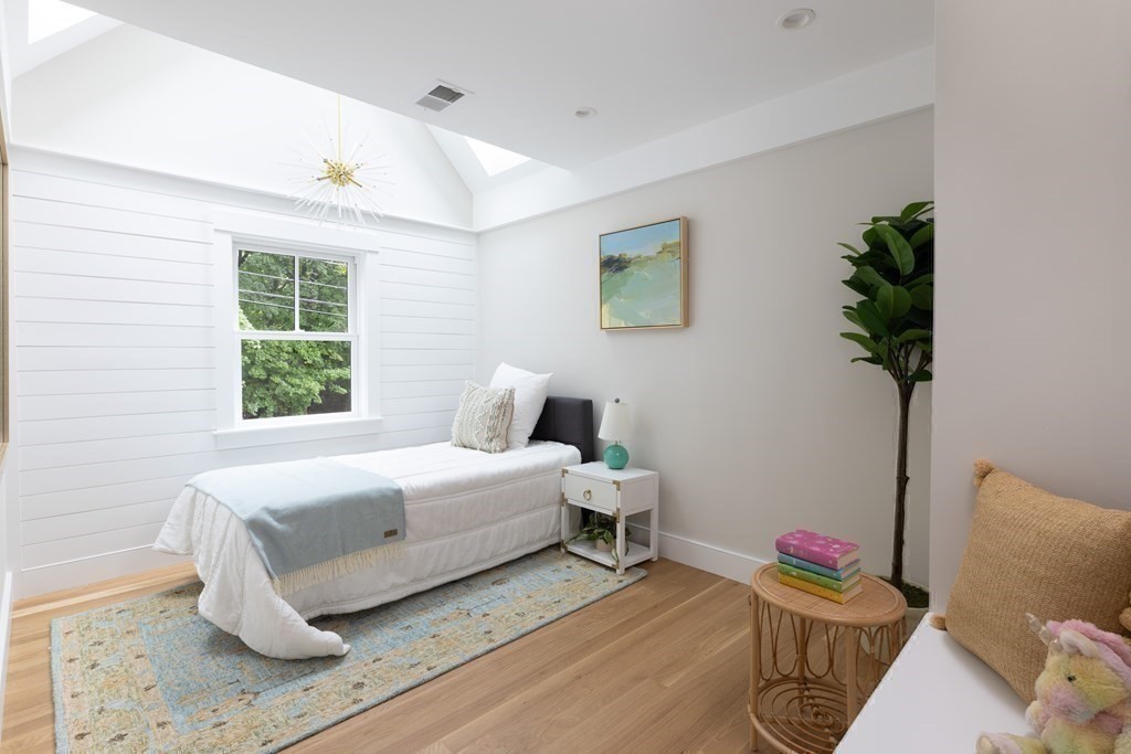 111 Jordan Road Brookline, MA 02446 - Photo 28 of 42 a bedroom with a bed and a window