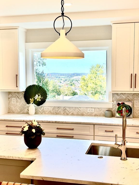 111 Jordan Road Brookline, MA 02446 - Photo 5 of 42 a kitchen with a sink and a stove
