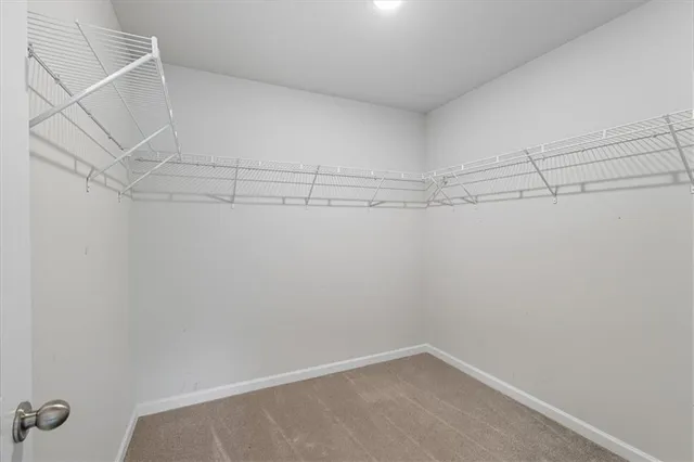 a view of a room with racks on the wall