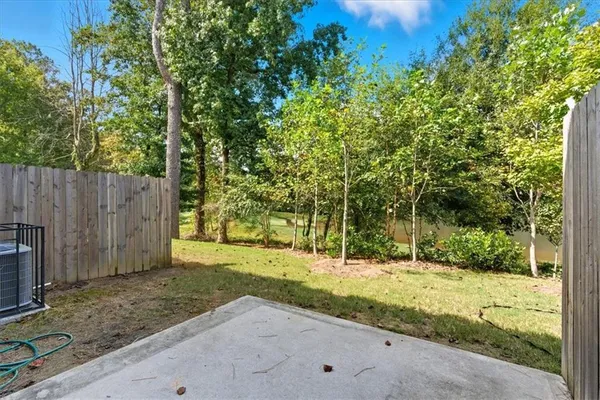 a view of backyard with tree