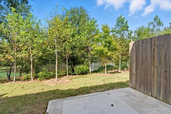 a backyard of a house with lots of green space