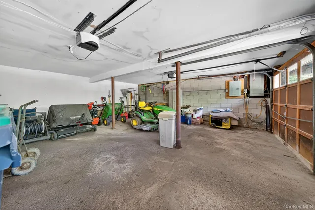 a view of a garage with parked cars