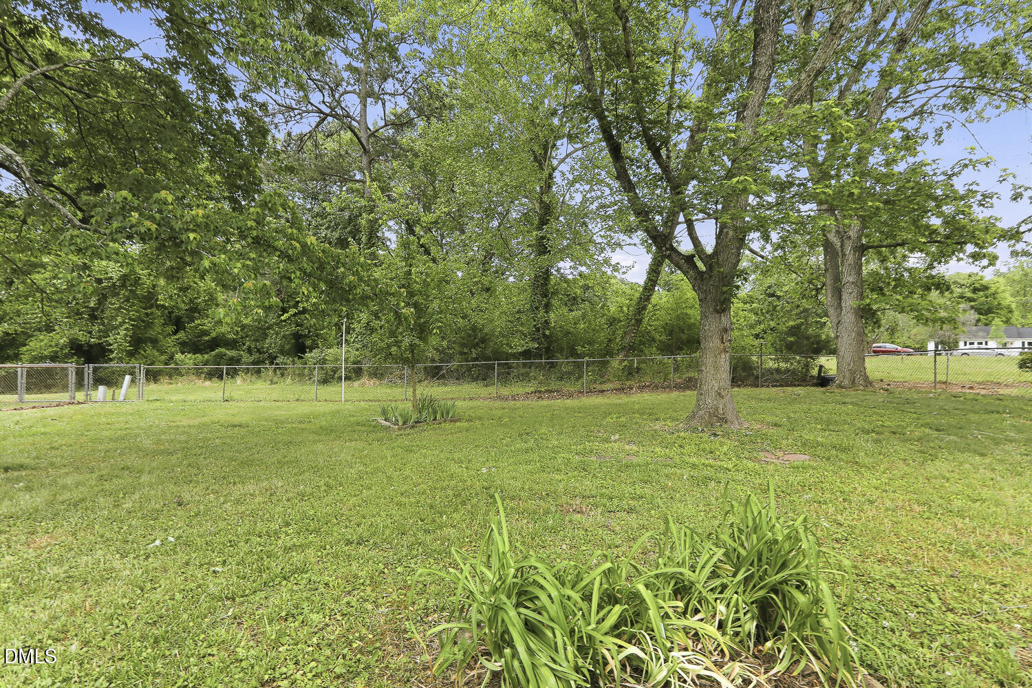 4904 Fox Hunt Road Durham, NC 27712 - Photo 10 of 11 Fenced Backyard