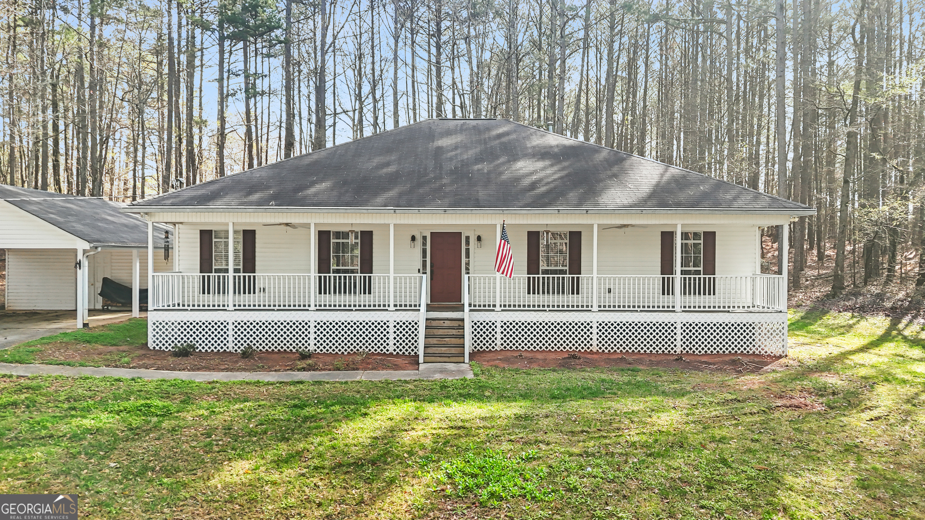 a house with yard in front of it