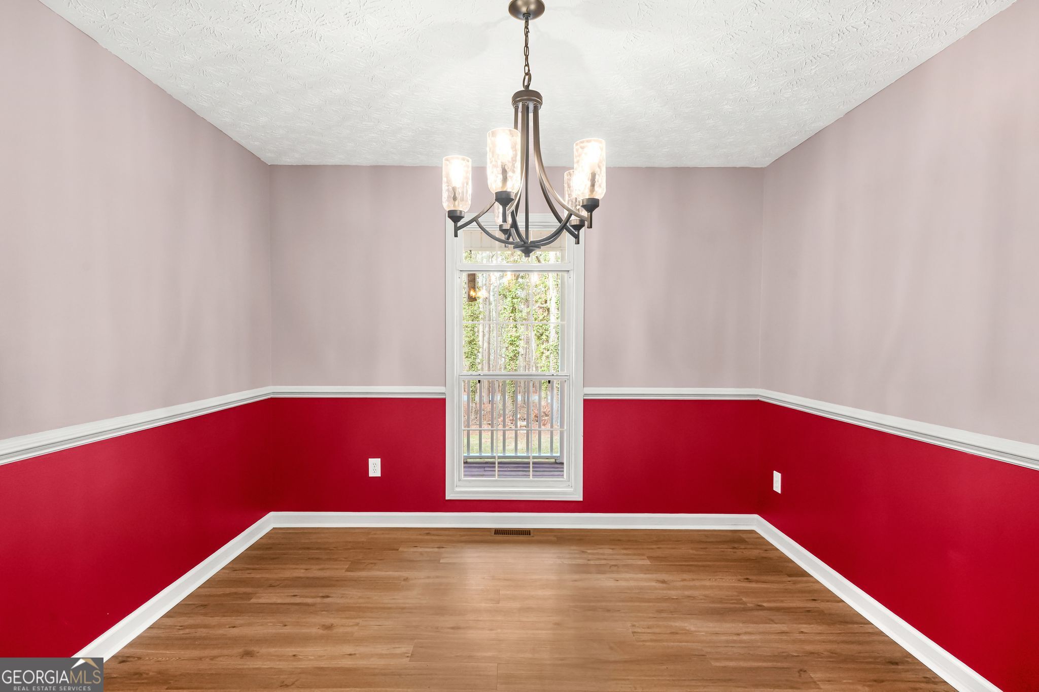156 Pine Street Covington, GA 30014 - Photo 12 of 37 a view of an empty room with window