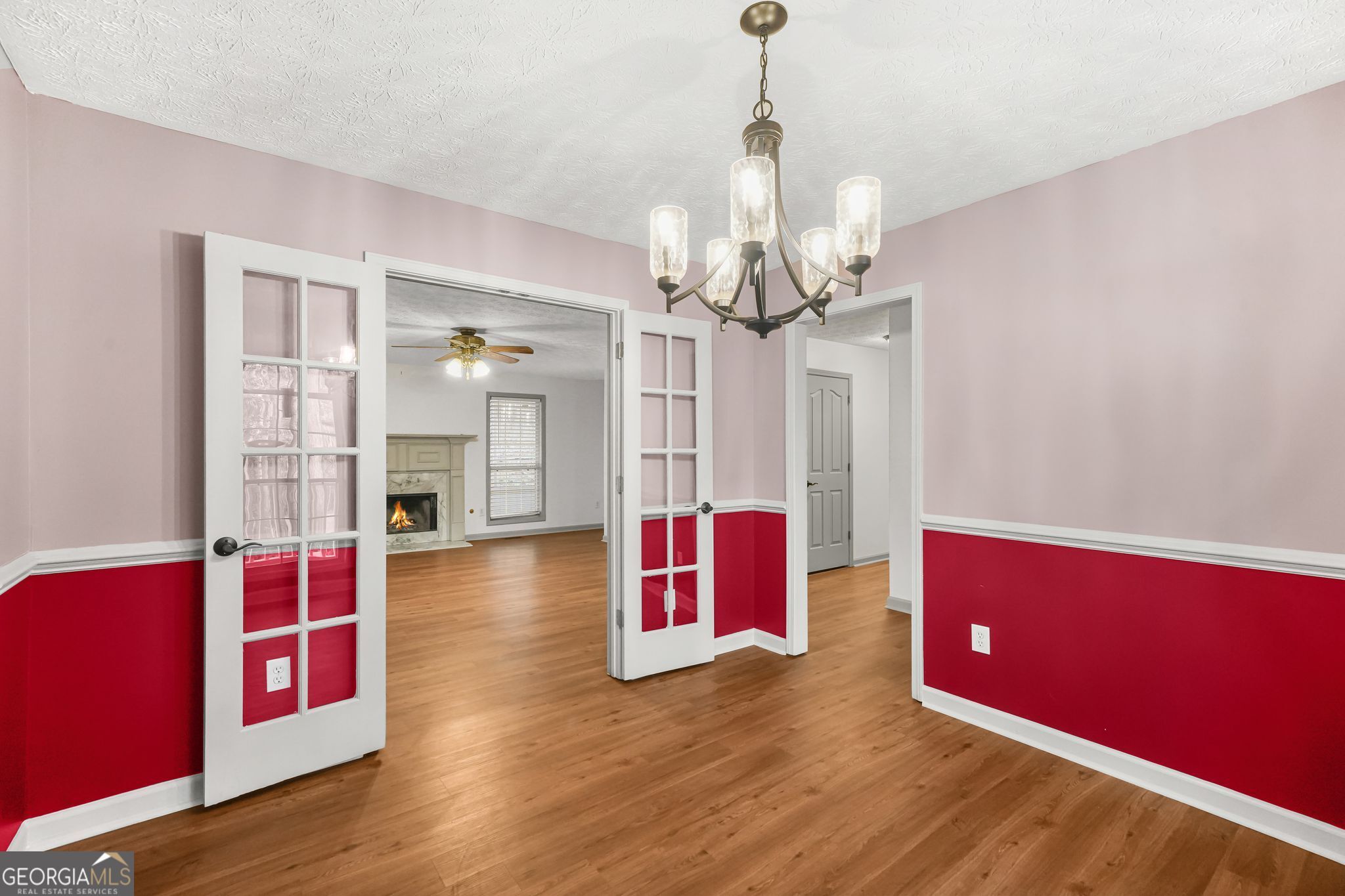 156 Pine Street Covington, GA 30014 - Photo 13 of 37 a view of livingroom with furniture and wooden floor