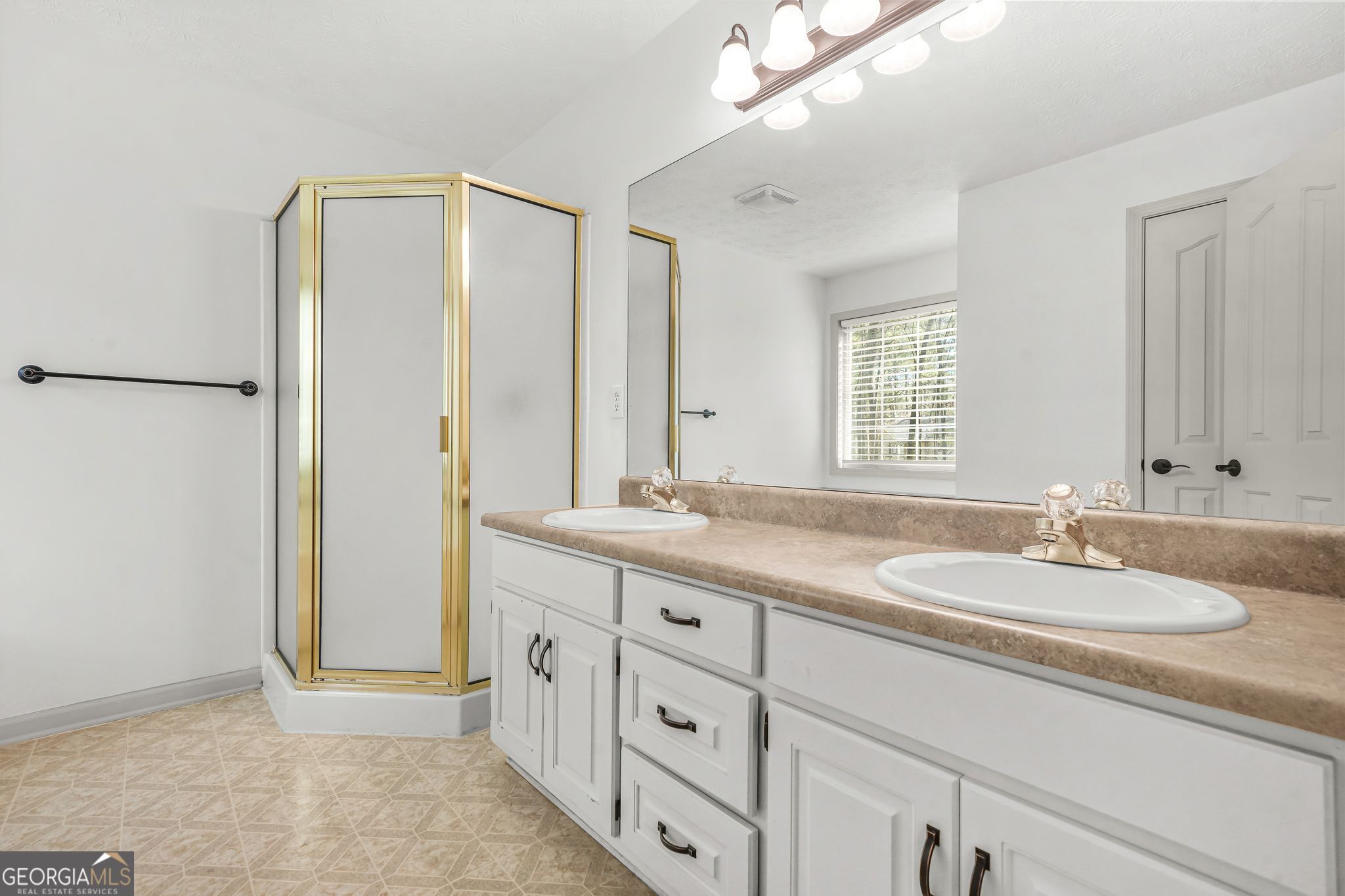 156 Pine Street Covington, GA 30014 - Photo 24 of 37 a bathroom with a granite countertop sink and a mirror