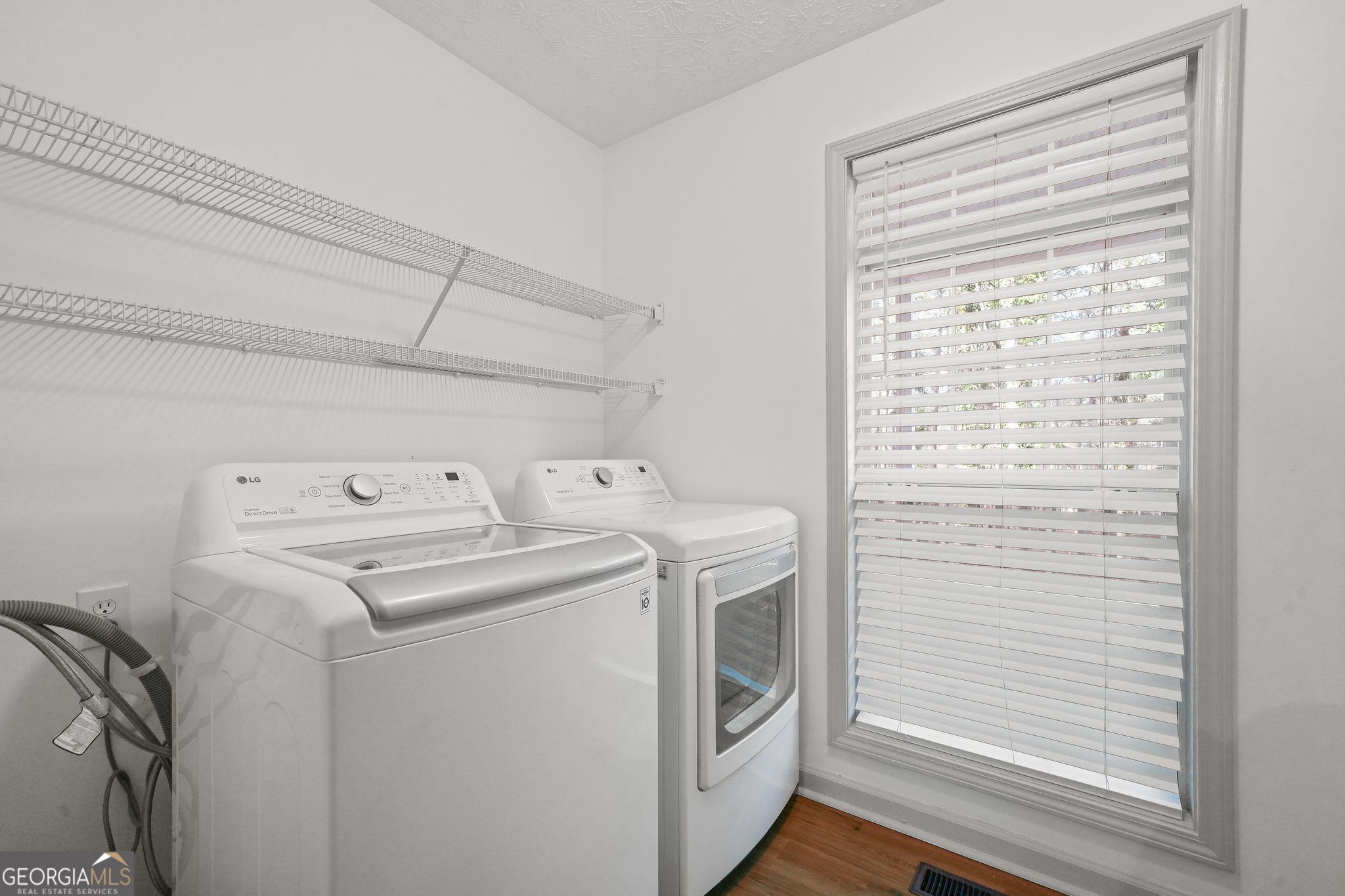 156 Pine Street Covington, GA 30014 - Photo 33 of 37 a utility room with dryer and washer