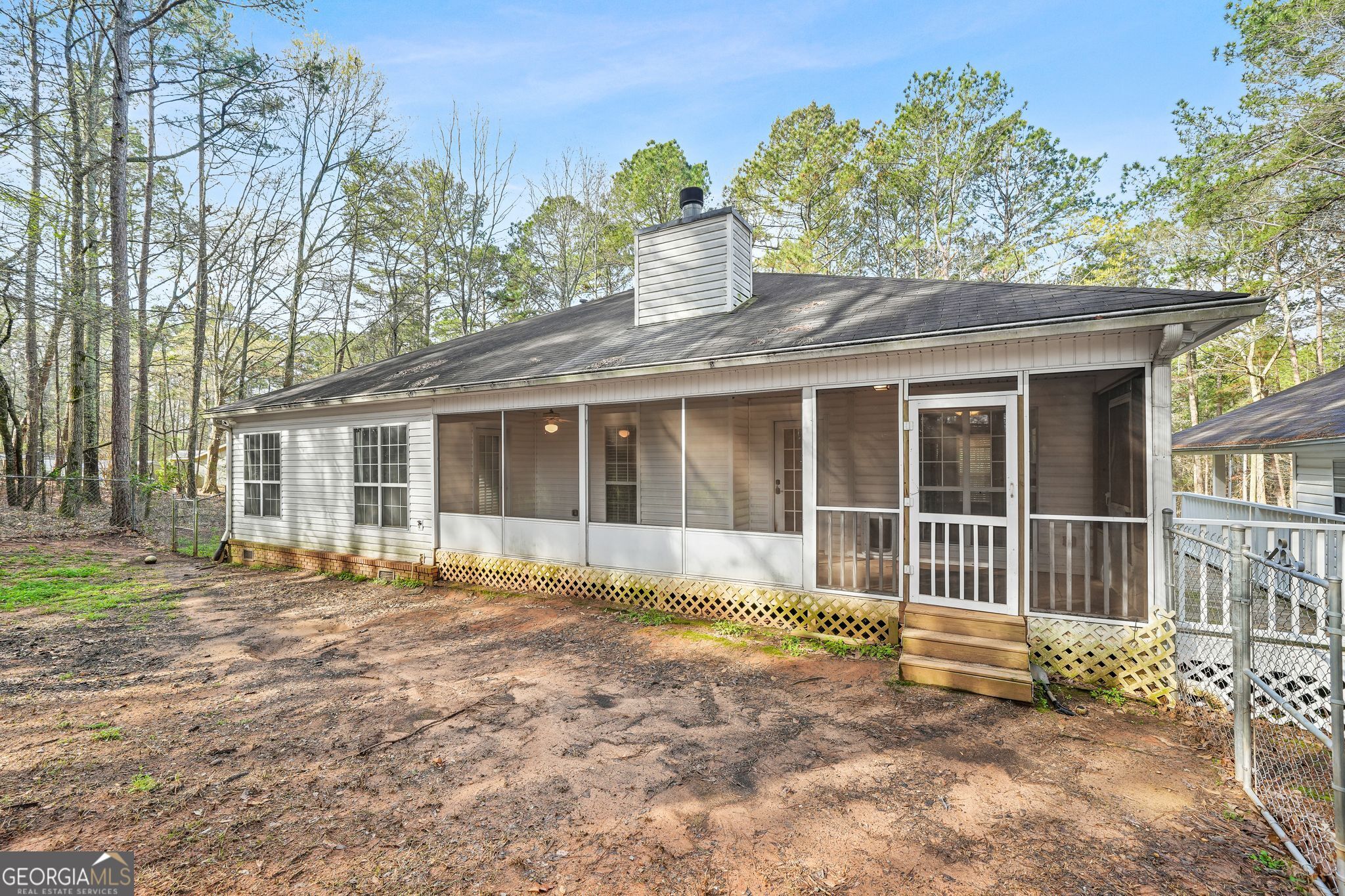 156 Pine Street Covington, GA 30014 - Photo 36 of 37 a house view with a garden space