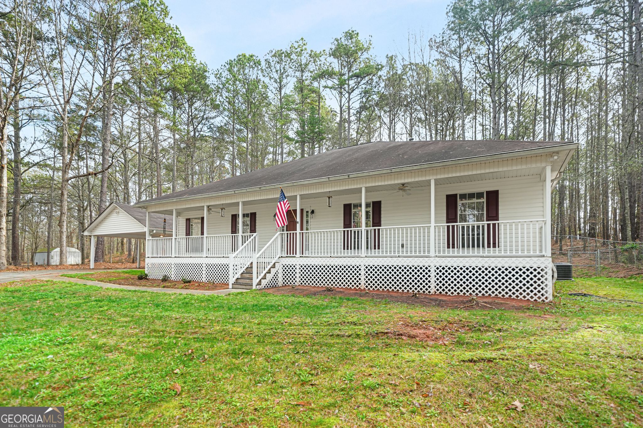 156 Pine Street Covington, GA 30014 - Photo 10 of 37 a front view of a house with a yard