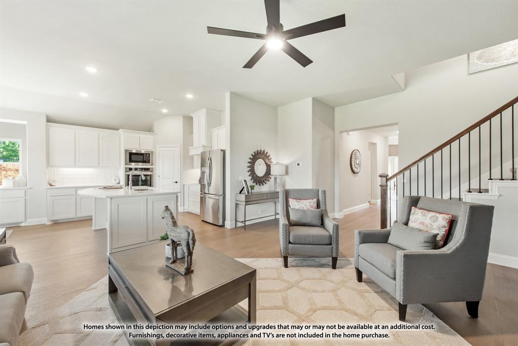 315 Spring Circle Red Oak, TX 75154 - Photo 14 of 40 a living room with furniture a rug and white walls