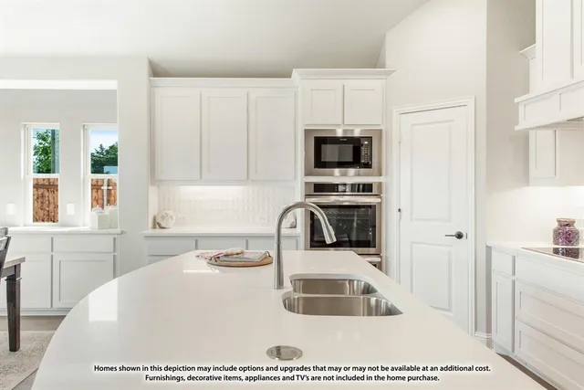 a bathroom with a sink vanity and a mirror