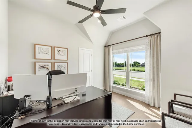 a dining room with furniture a rug and wooden floor