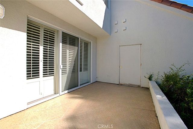 a bathroom with a toilet sink and shower