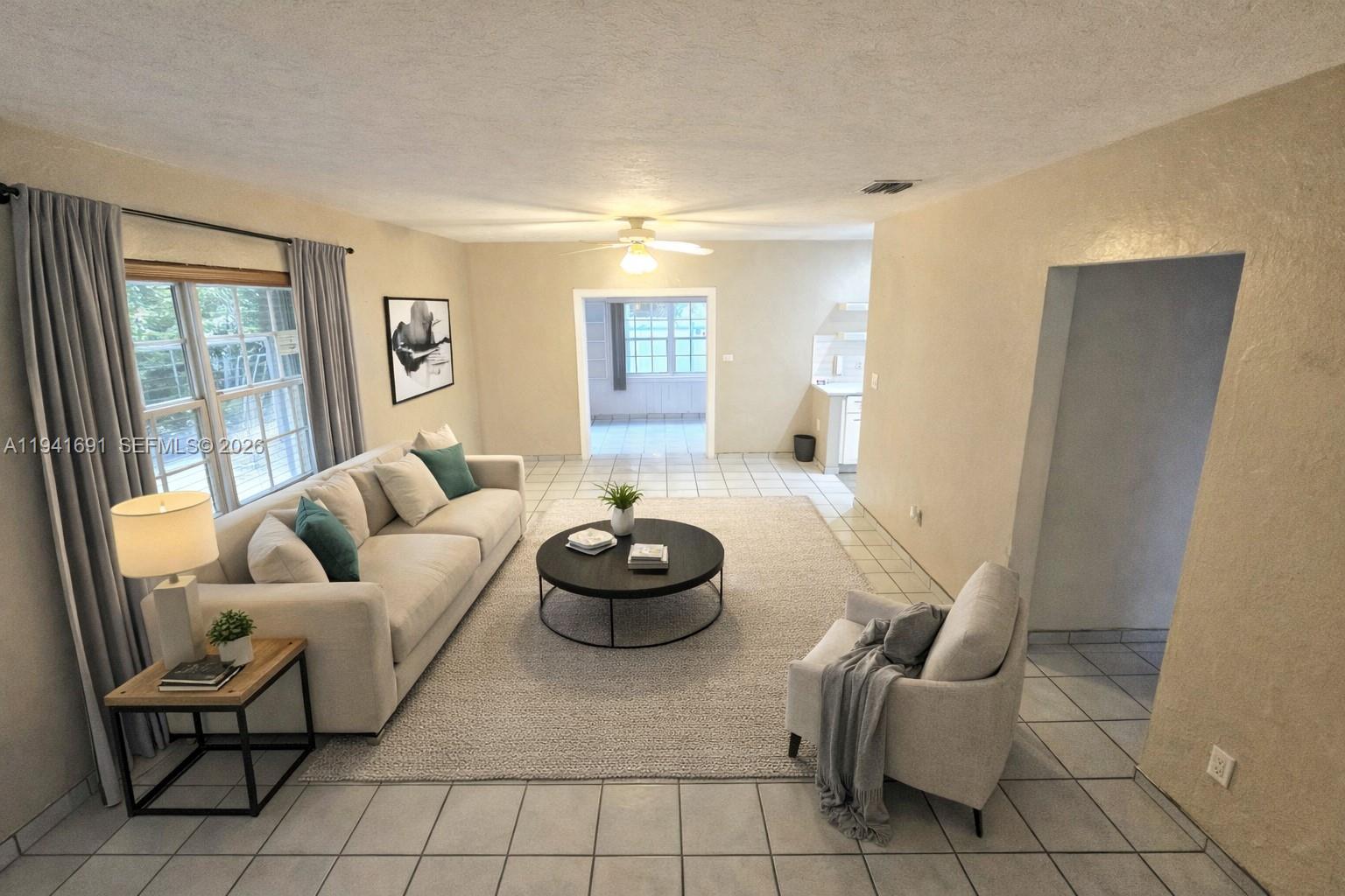 3015 Southwest 24th Terrace Miami, FL 33145 - Photo 3 of 22 a living room with furniture and a rug