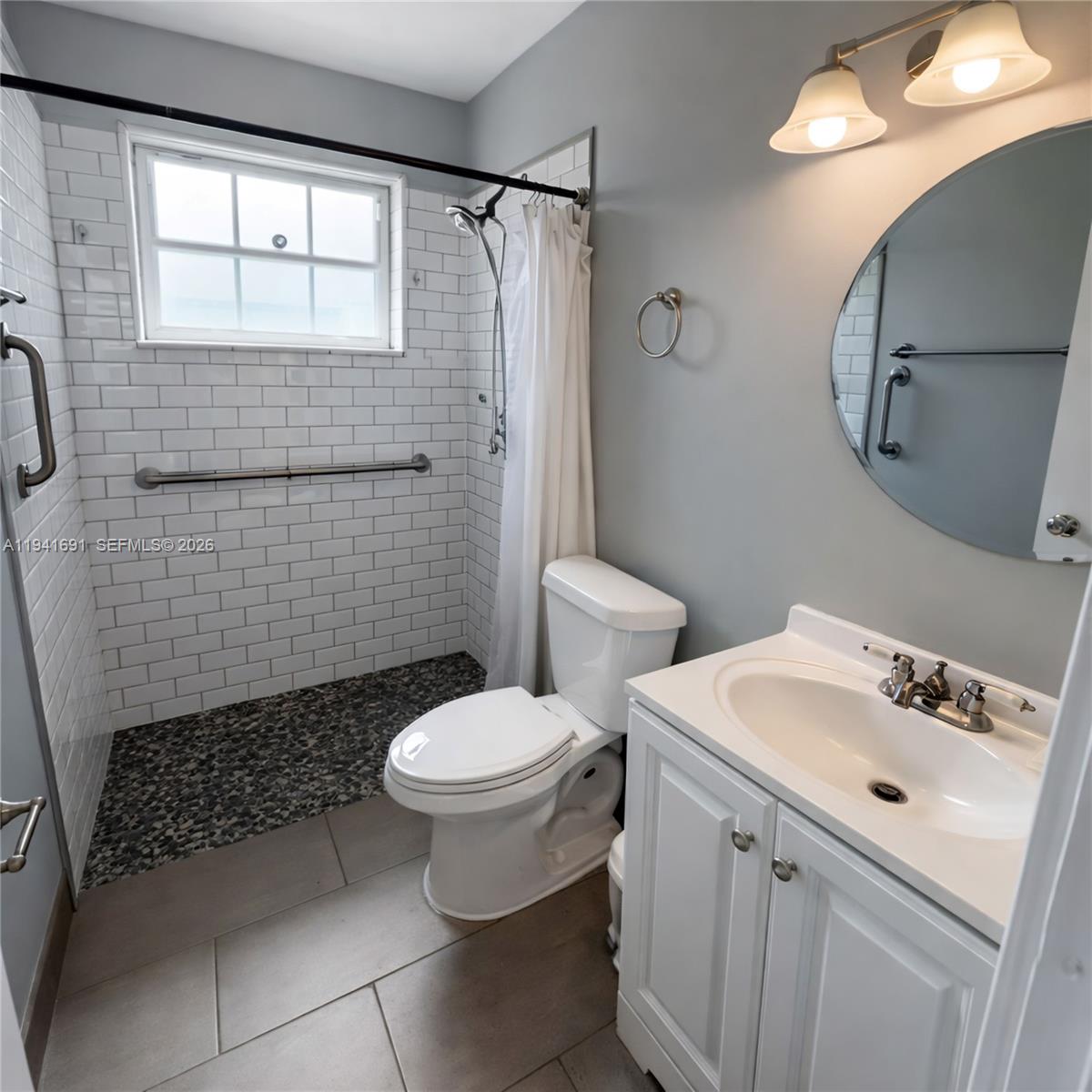 3015 Southwest 24th Terrace Miami, FL 33145 - Photo 6 of 22 a bathroom with a sink toilet and shower