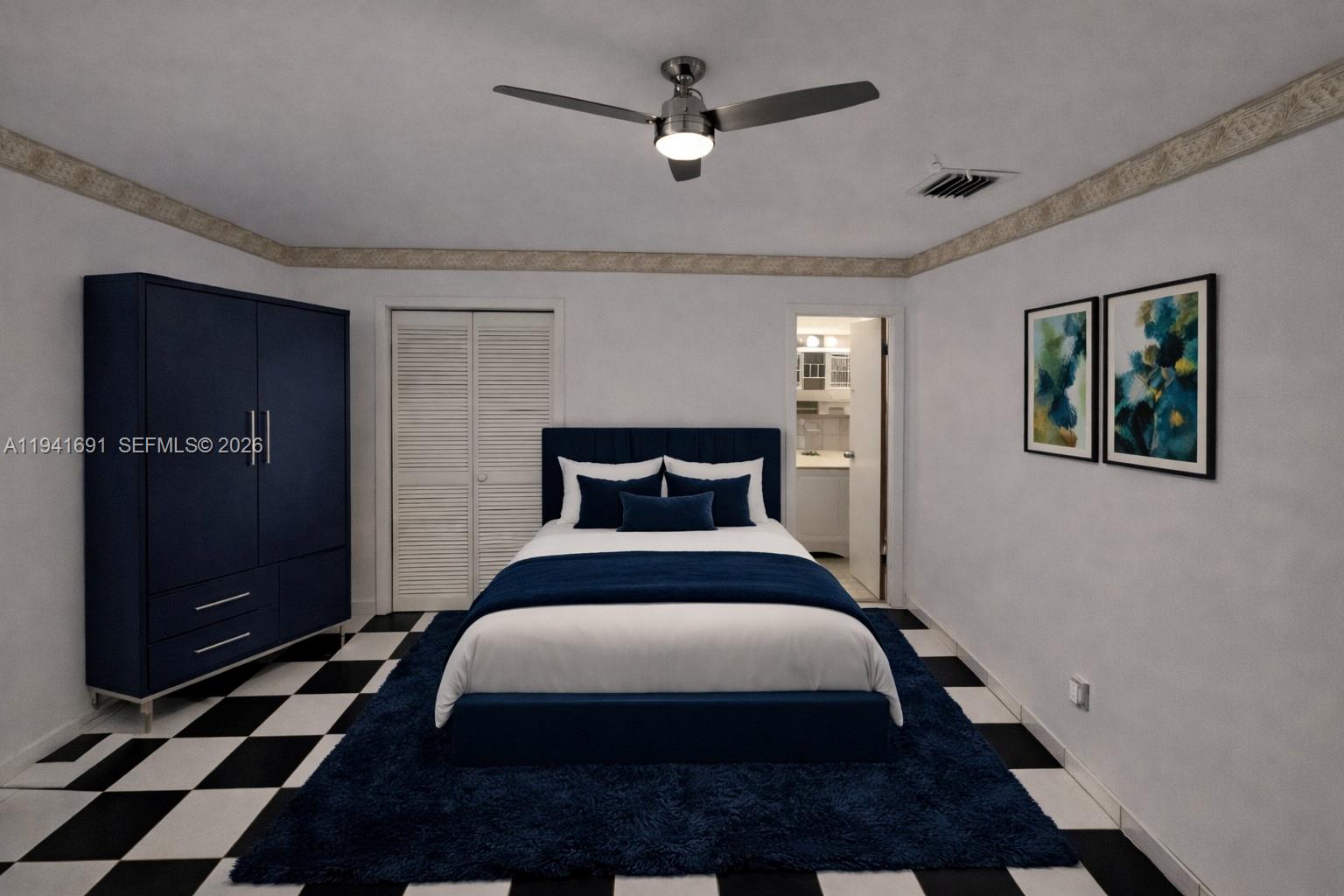 3015 Southwest 24th Terrace Miami, FL 33145 - Photo 10 of 22 a bedroom with a bed and a walk in closet