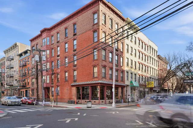 a view of a building with a street