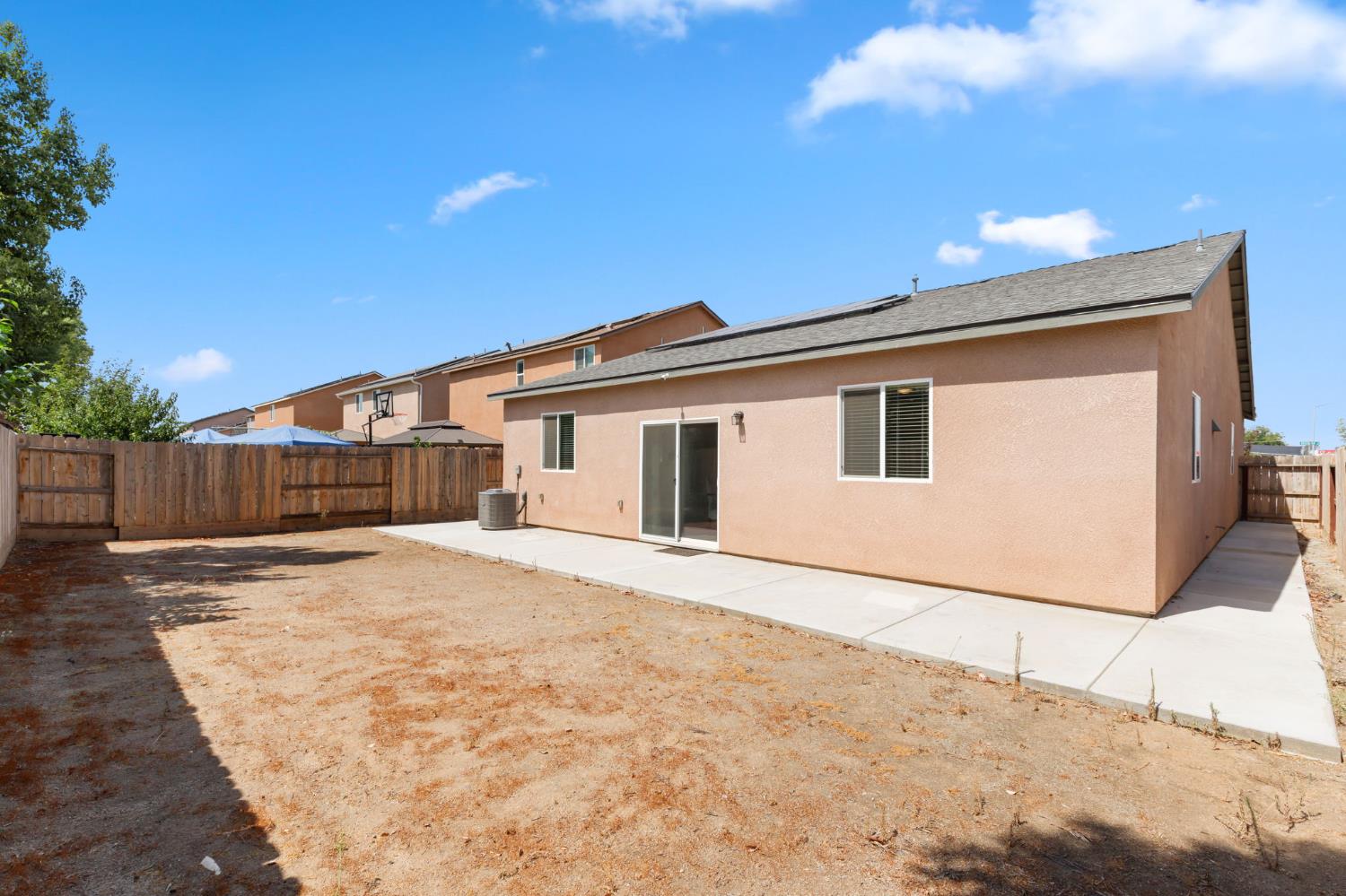 282 Rosebriar Street Madera, CA 93638 - Photo 24 of 28 a view of a house with a snow in the background