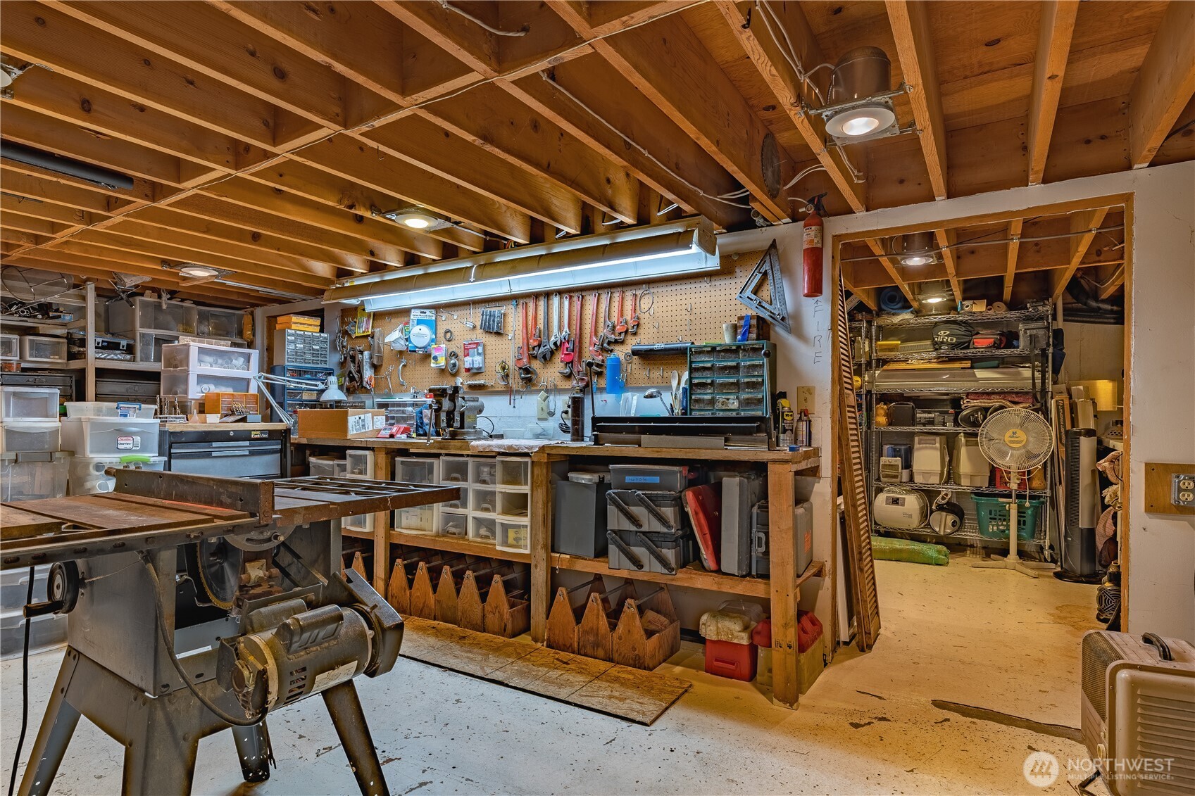 826 South Skylark Way Othello, WA 99344 - Photo 38 of 40 a view of a storage room with racks a table and chairs