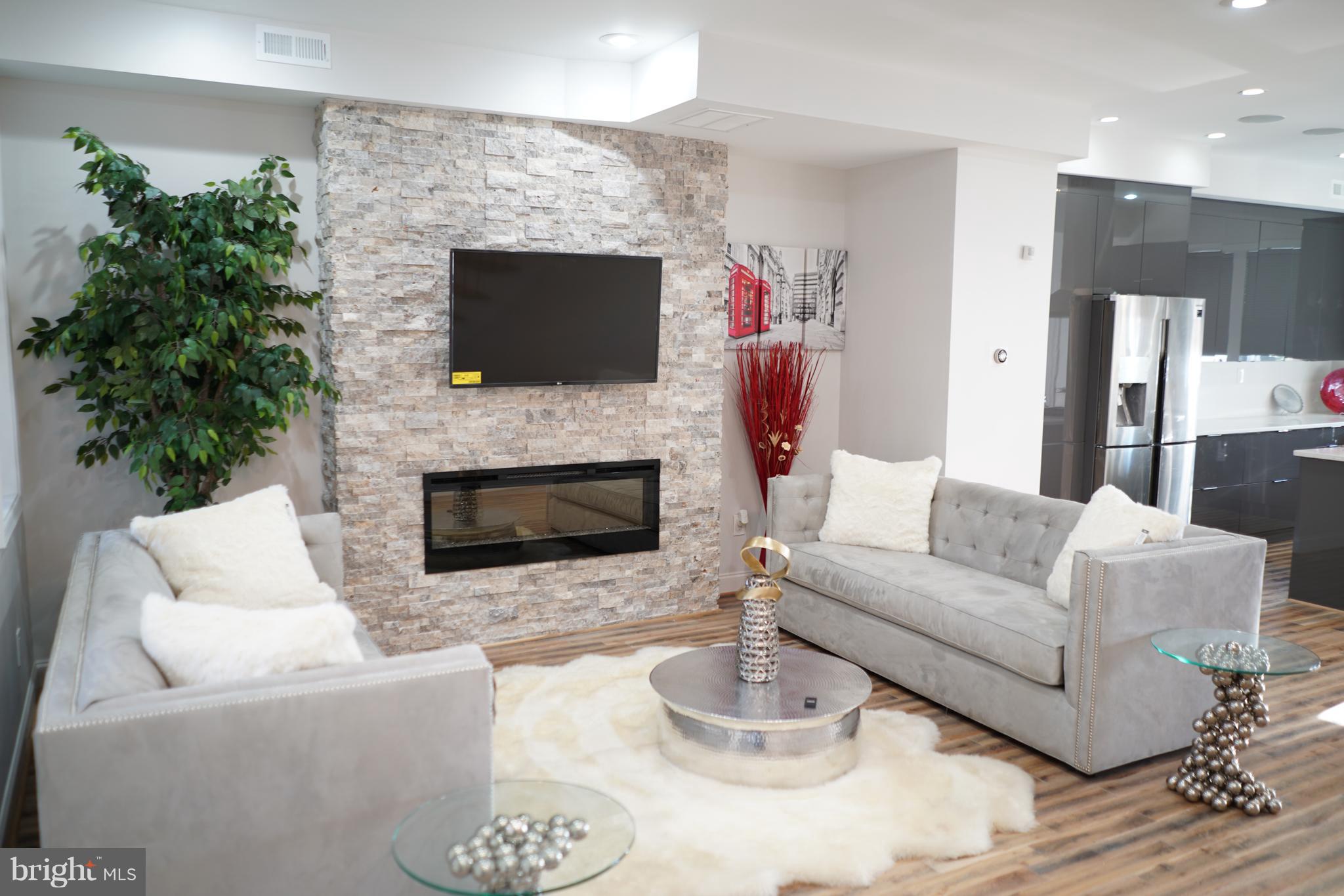 4222 Falls Road Baltimore, MD 21211 - Photo 2 of 22 Living Room with fireplace