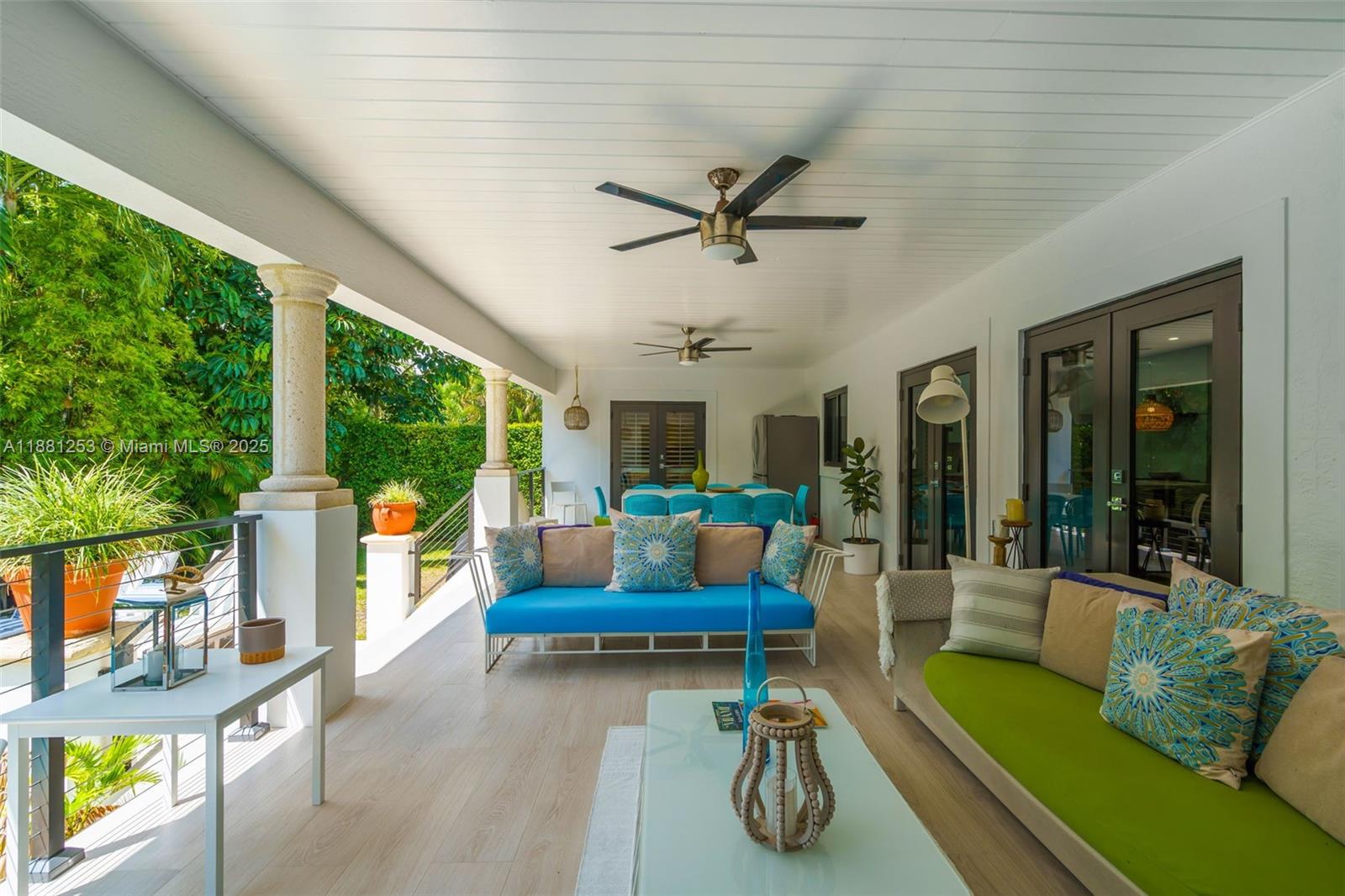 340 Woodcrest Road Key Biscayne, FL 33149 - Photo 24 of 51 a living room with furniture and a large window