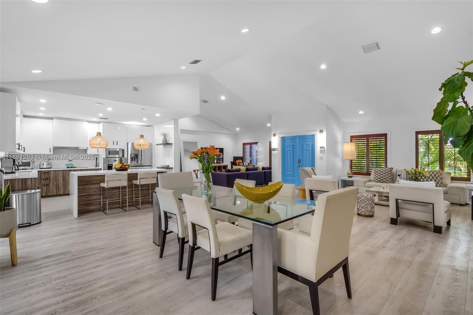 340 Woodcrest Road Key Biscayne, FL 33149 - Photo 3 of 51 a view of a dining area with furniture