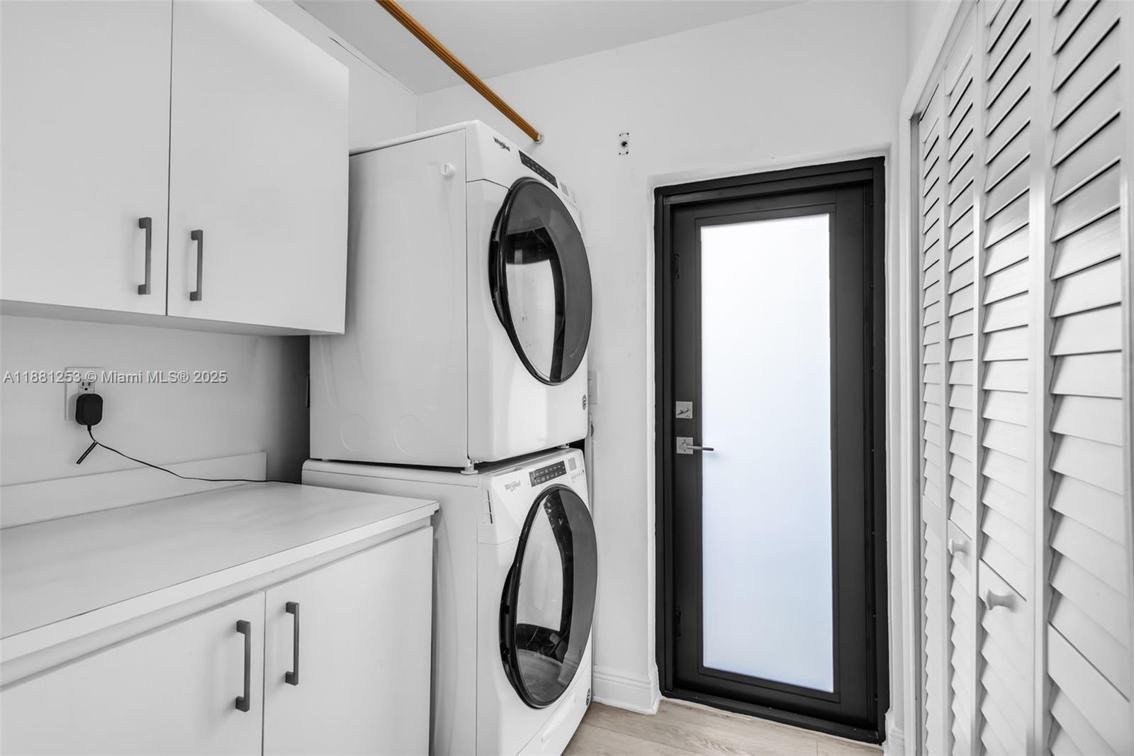 340 Woodcrest Road Key Biscayne, FL 33149 - Photo 38 of 51 a utility room with dryer and washer