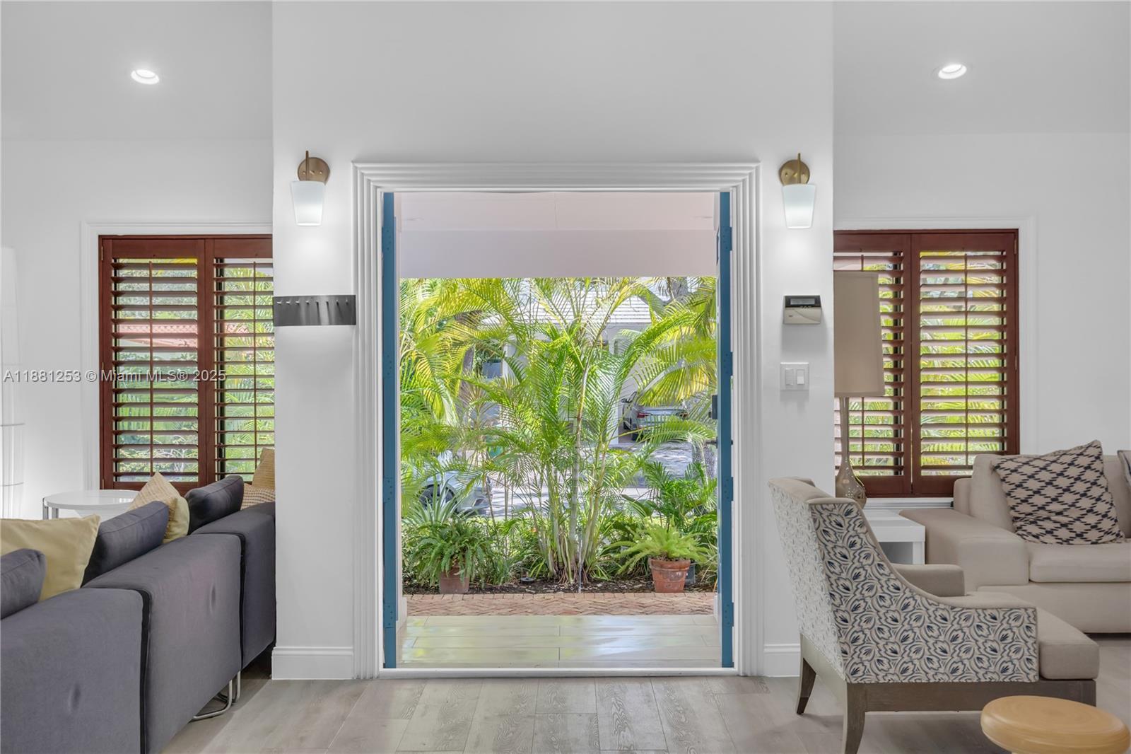 340 Woodcrest Road Key Biscayne, FL 33149 - Photo 39 of 51 a living room with furniture and a window