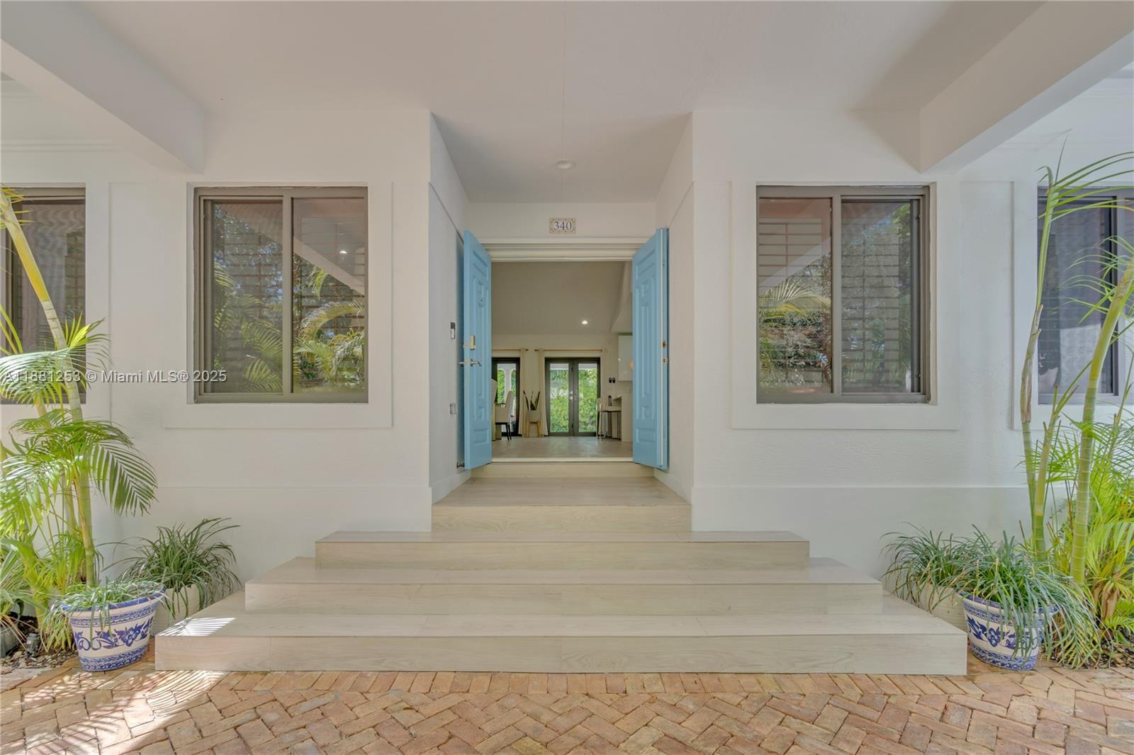 340 Woodcrest Road Key Biscayne, FL 33149 - Photo 40 of 51 a view of an entryway of house