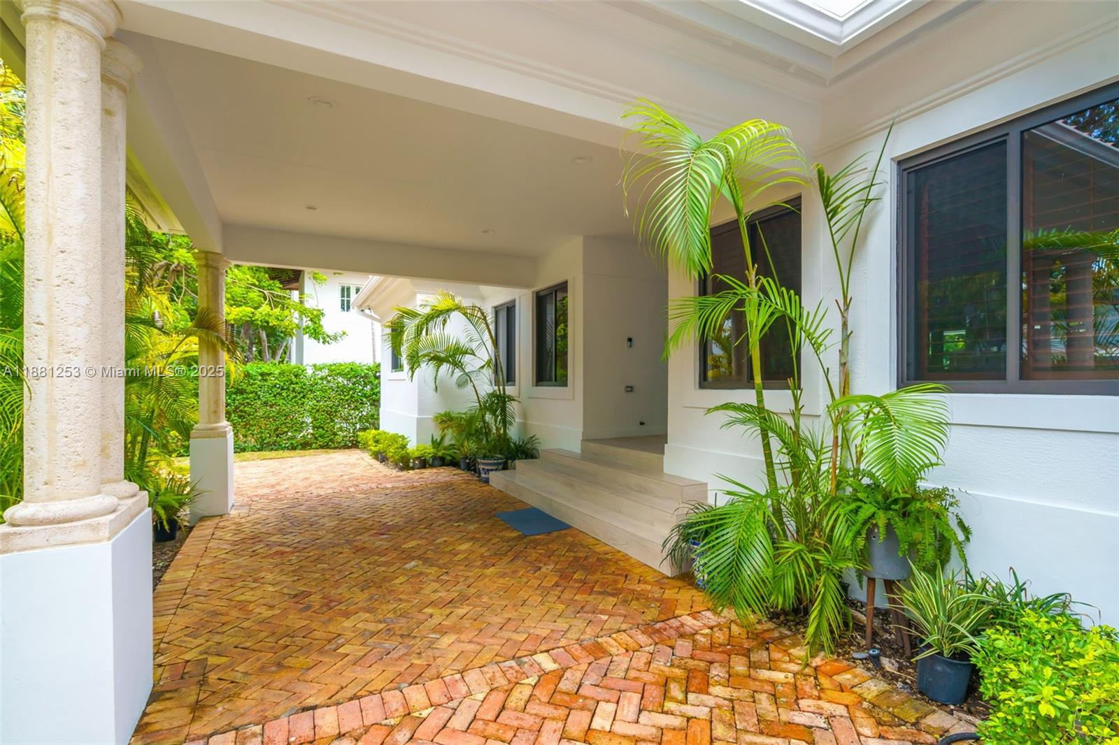 340 Woodcrest Road Key Biscayne, FL 33149 - Photo 41 of 51 a view of a garden with patio
