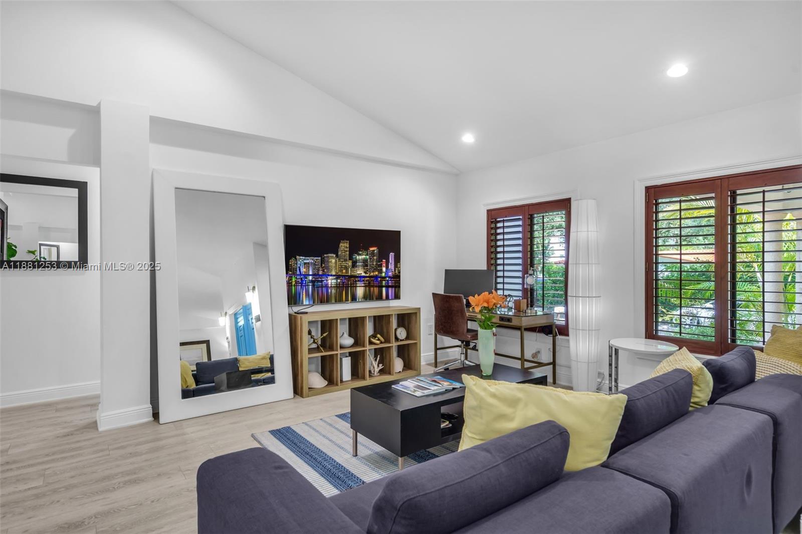 340 Woodcrest Road Key Biscayne, FL 33149 - Photo 6 of 51 a living room with furniture and a wooden floor