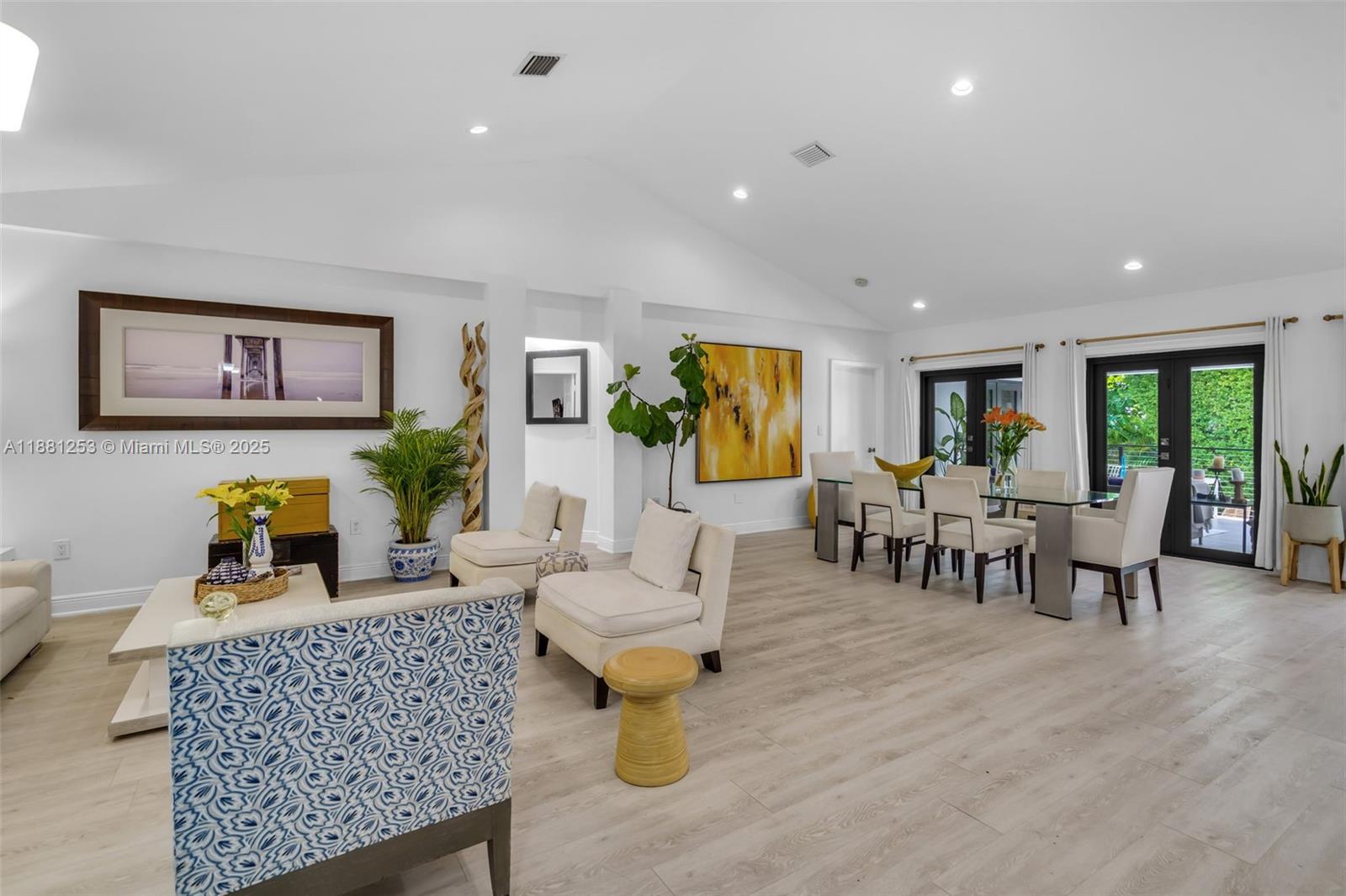 340 Woodcrest Road Key Biscayne, FL 33149 - Photo 7 of 51 a living room with furniture and large window