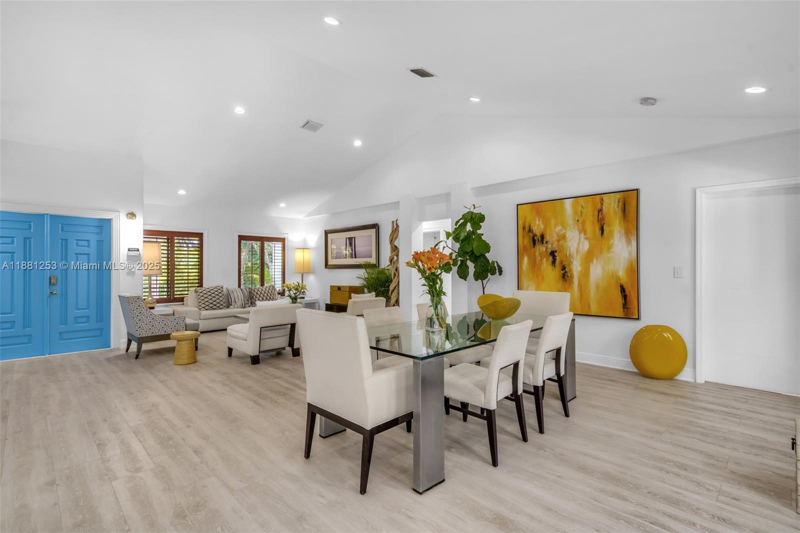 340 Woodcrest Road Key Biscayne, FL 33149 - Photo 9 of 51 a view of a dining room with furniture and wooden floor
