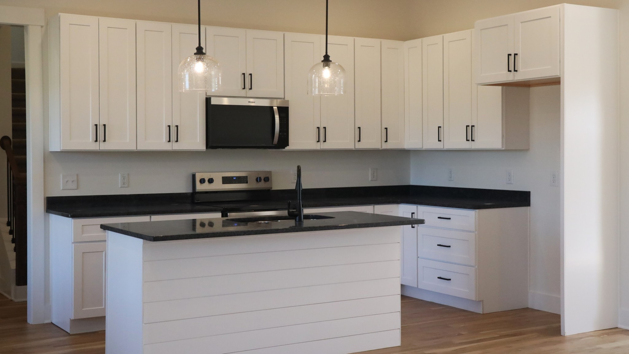 5558 Borthick Road Springfield, TN 37172 - Photo 11 of 53 a kitchen with granite countertop white cabinets and stainless steel appliances