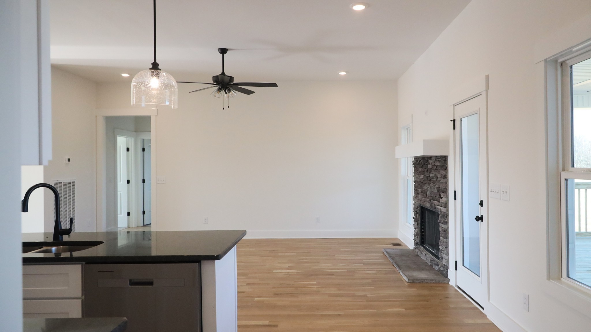 5558 Borthick Road Springfield, TN 37172 - Photo 9 of 53 a view of a kitchen with a sink and chandelier