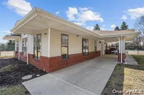 a view of a house with sitting area