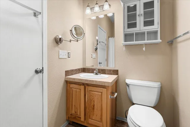 a bath tub sitting in a bathroom next to a window