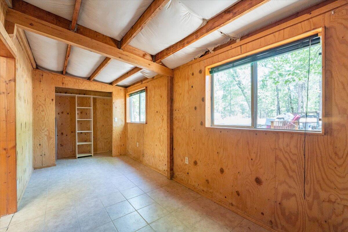 15288 Sherwood Forrest Road Oak Run, CA 96069 - Photo 42 of 91 a view of an empty room with a window