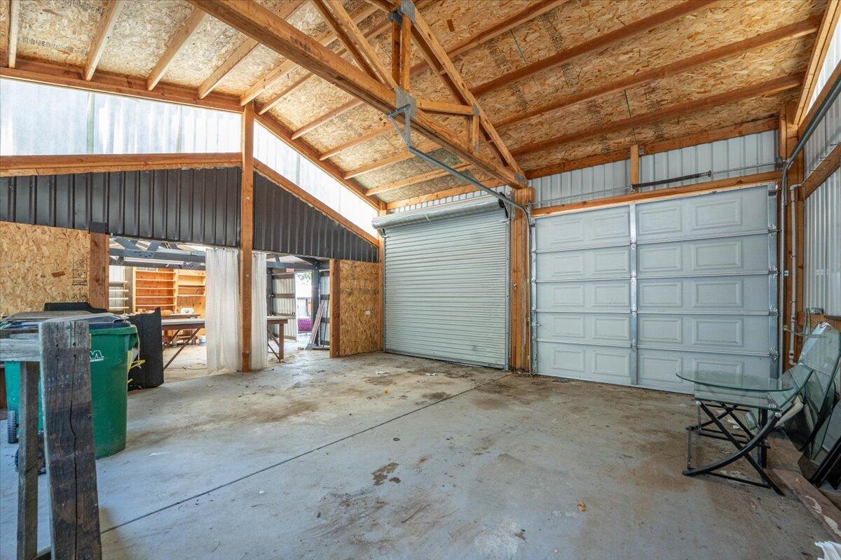 15288 Sherwood Forrest Road Oak Run, CA 96069 - Photo 48 of 91 a view of a car garage