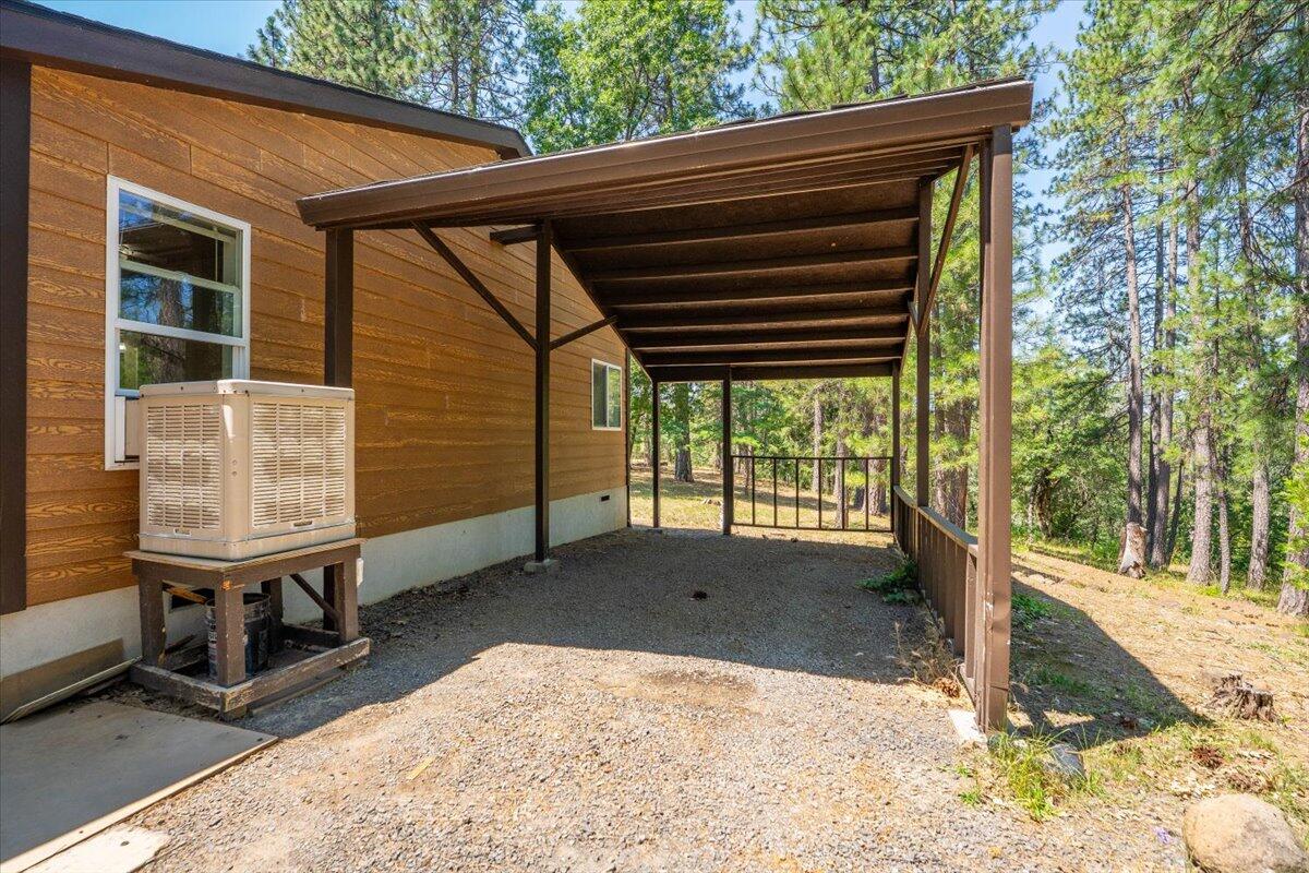 15288 Sherwood Forrest Road Oak Run, CA 96069 - Photo 59 of 91 a backyard of a house with seating space