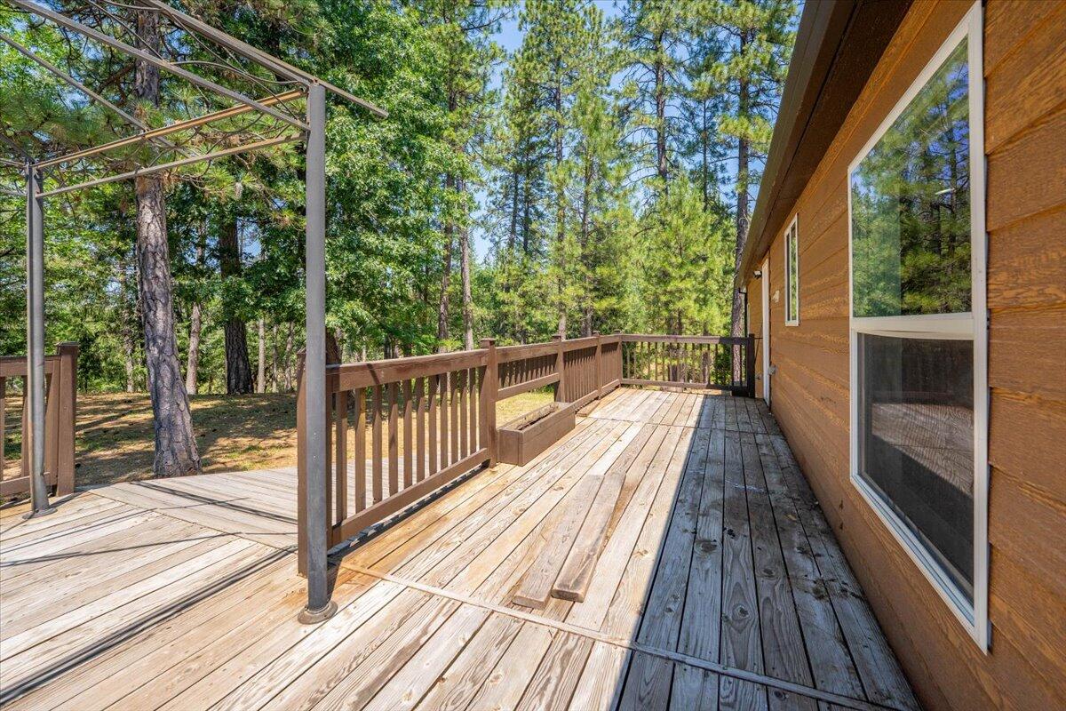 15288 Sherwood Forrest Road Oak Run, CA 96069 - Photo 66 of 91 a view of balcony with wooden floor and fence